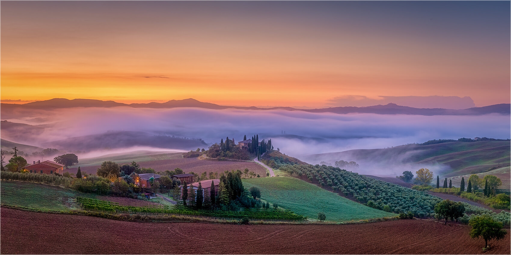 Panoramabild  Morgennebel in der Toskana