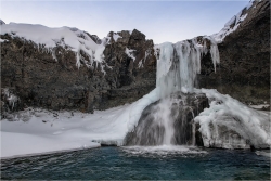 Wandbild Vereister Wasserfall Island